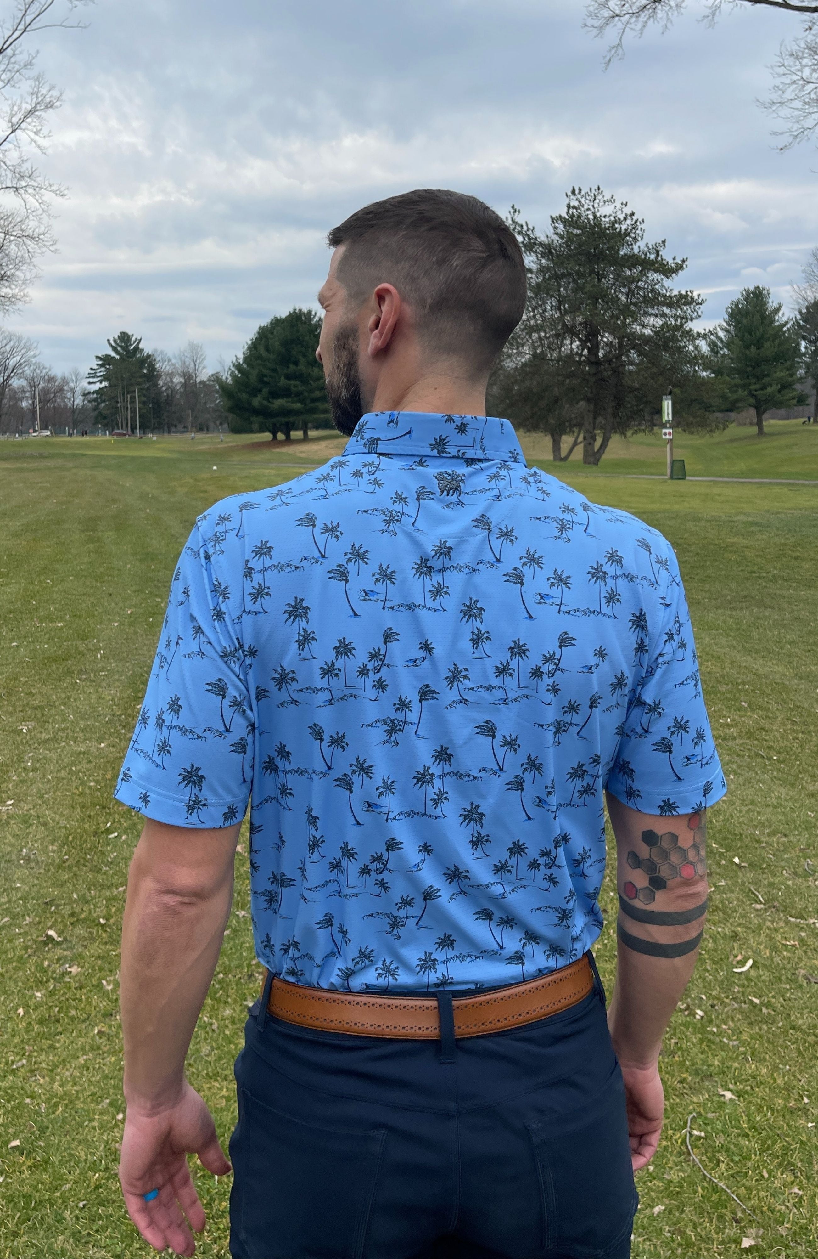 Tropical Breeze Perforated Polo – Zipelly